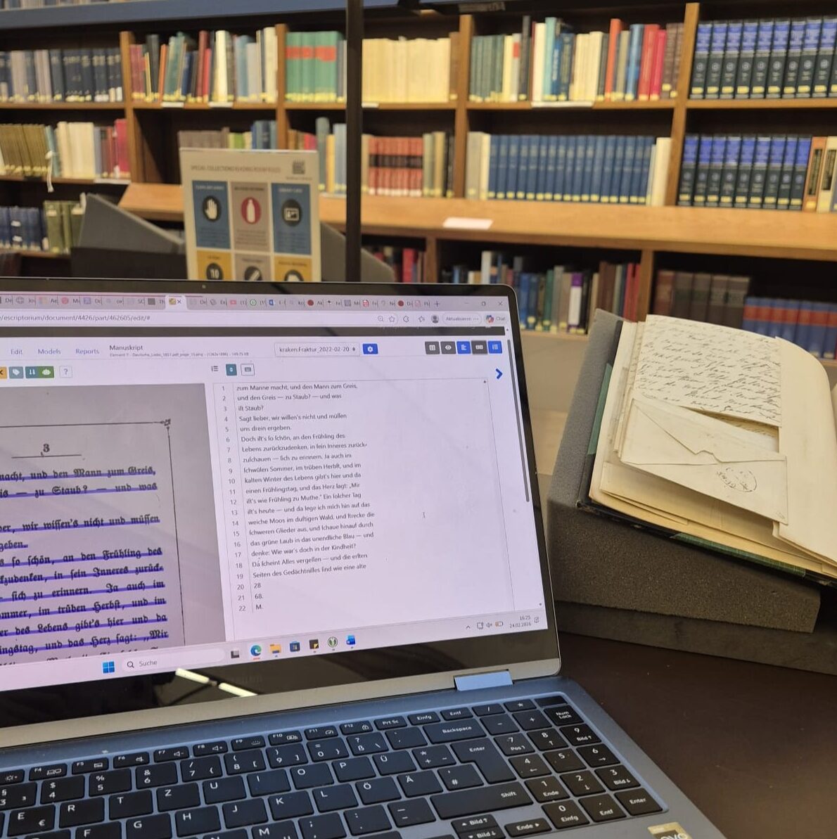 Using eScriptorium on a laptop to transcribe a PDF of Deutsche Liebe at the Weston Library; in the background, bound volumes of Friedrich Max Müller’s personal correspondence (Shelfmark: MS. Eng. d. 2362)